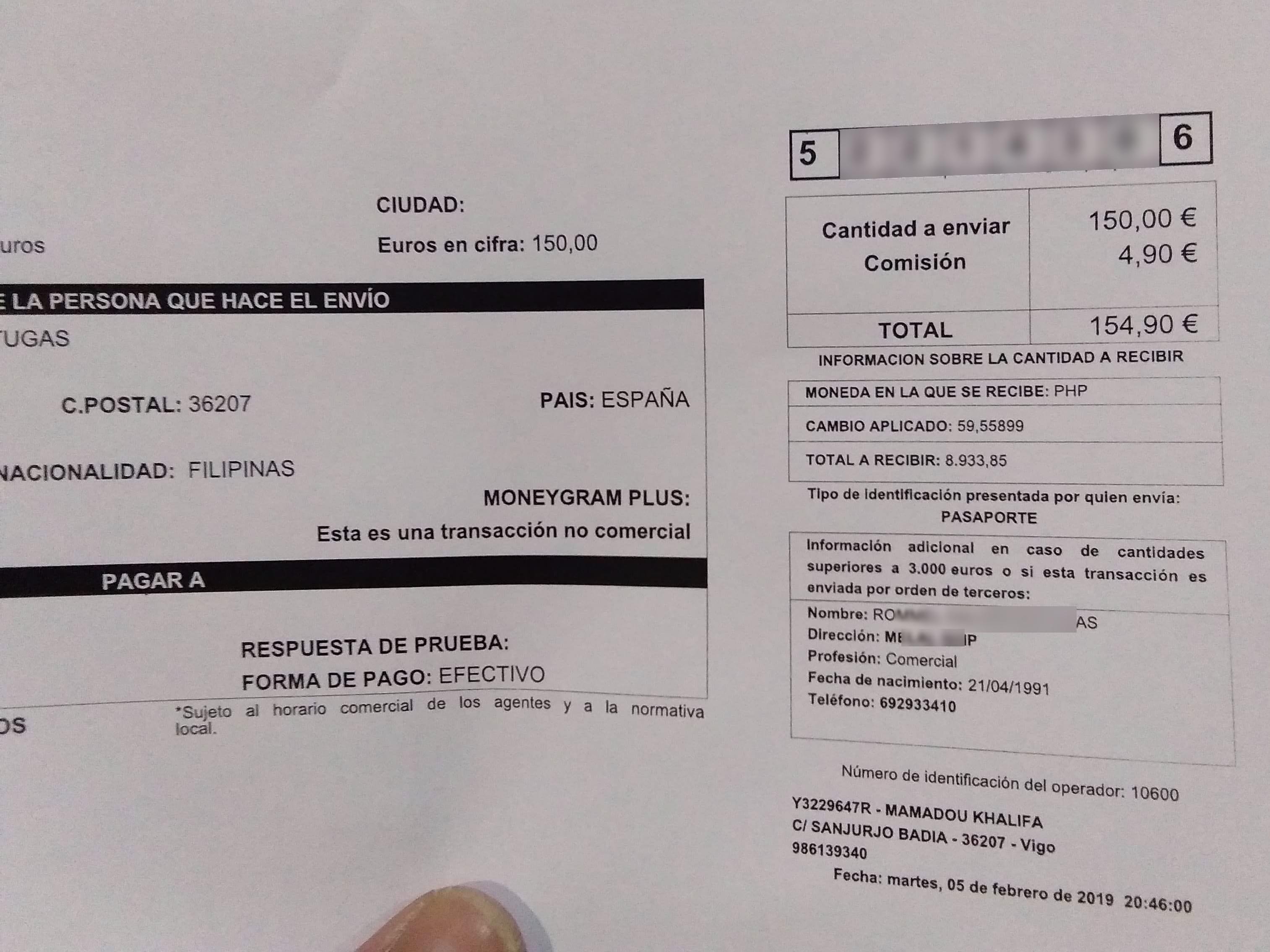 A receipt written in Spanish for sending extra money from Europe to the Philippines using Moneygram.