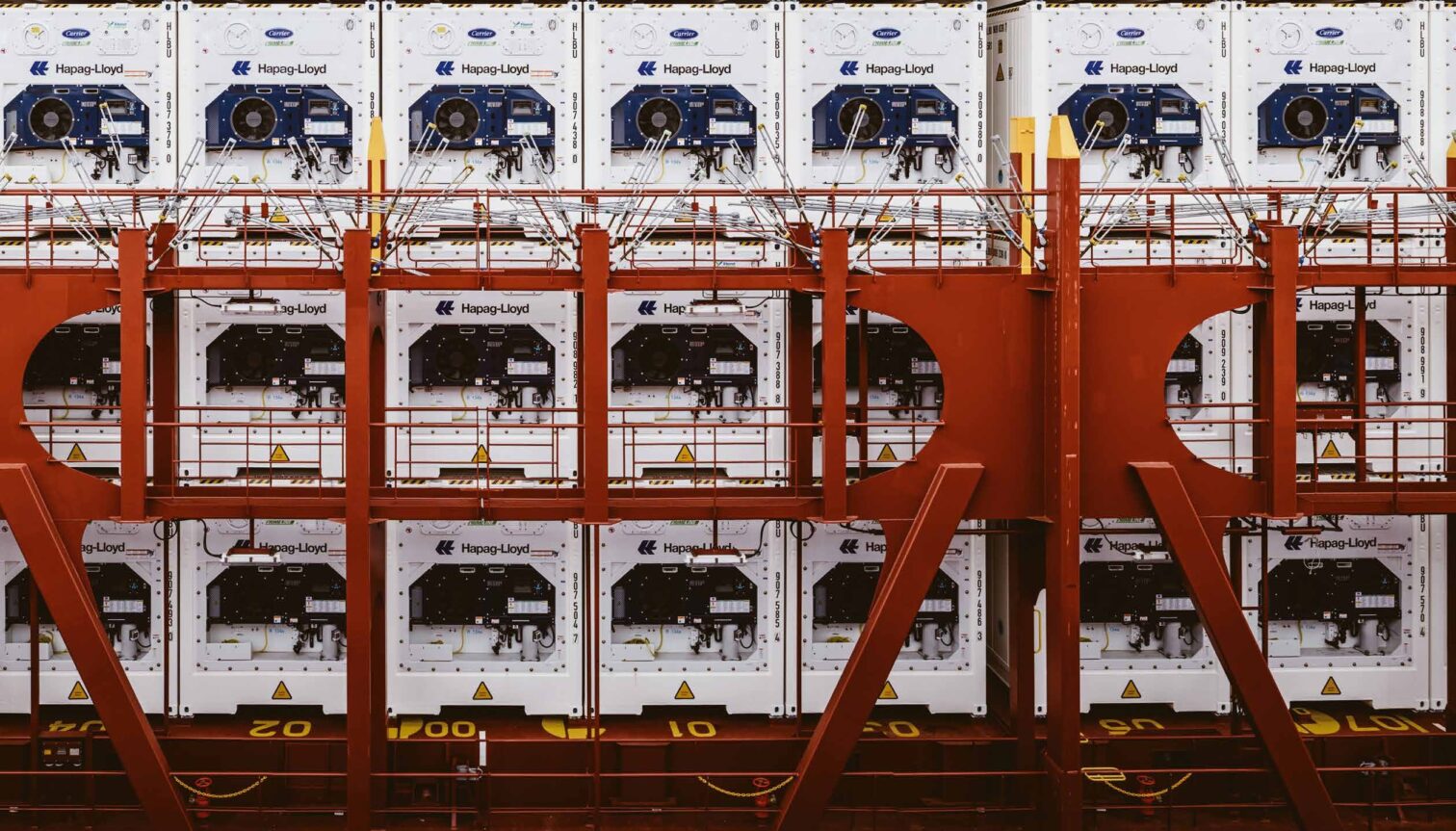 White reefer containers of Hapag-Lloyd loaded on board a vessel.