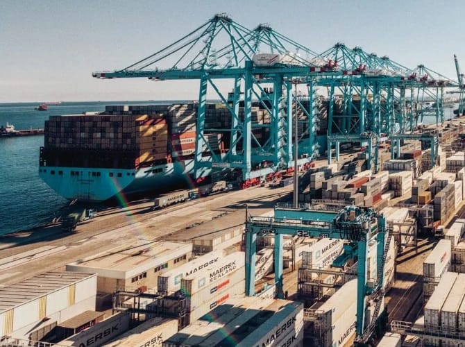 Maersk Container ship docked in a terminal.