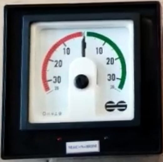 Rudder angle indicator showing the rudder at amidships position