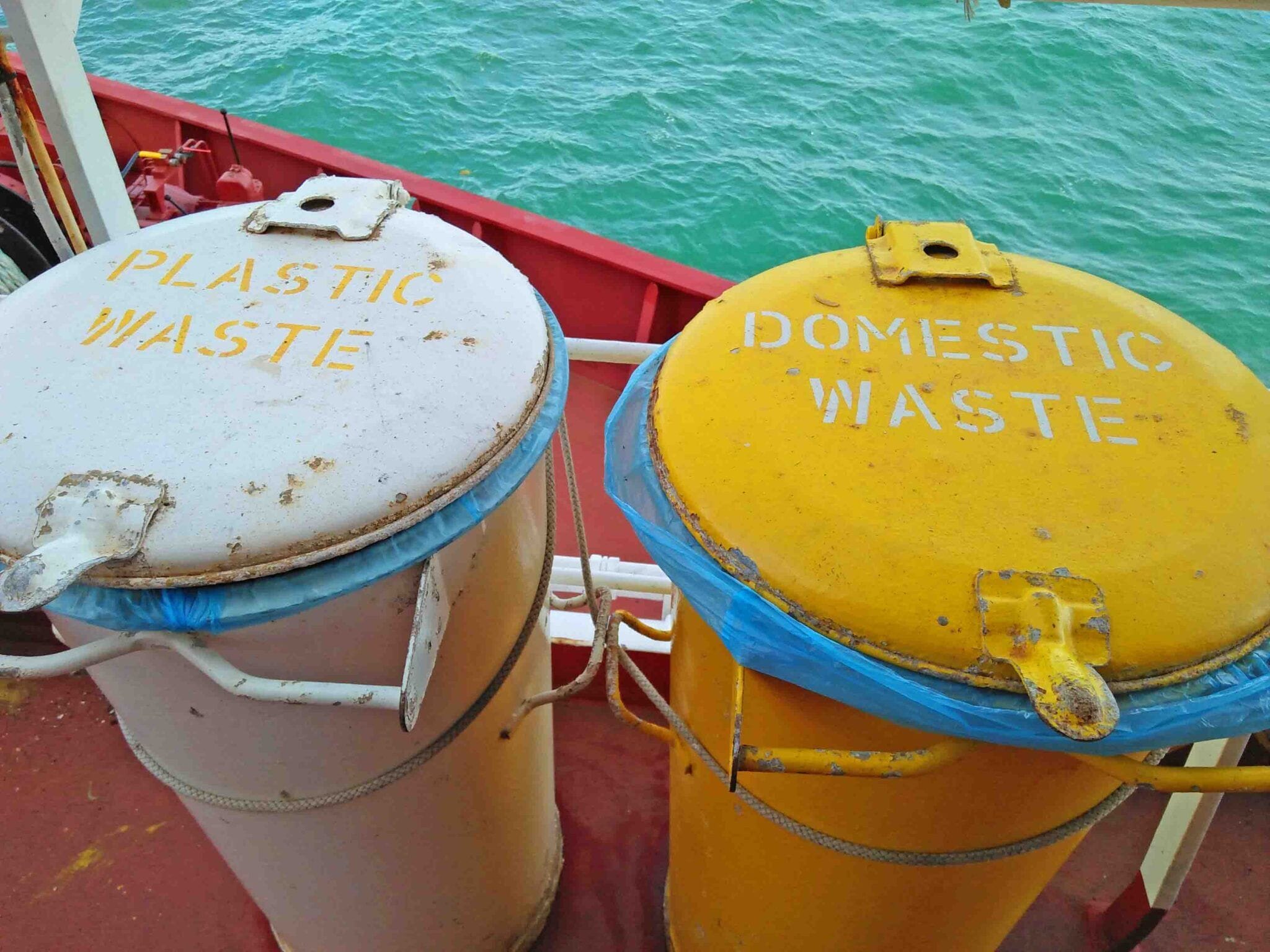 Garbage containers with colors white for Plastic Waste and Yellow for domestic Waste as part of proper segregation on board.