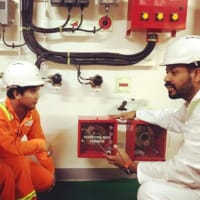 An Officer training his crew about an important ship equipment.